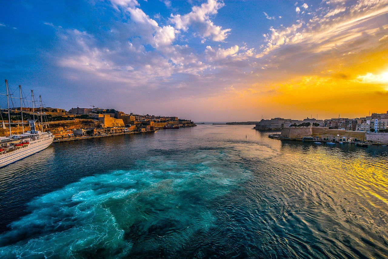 Malta Grand Harbour at sunset — short-let property management